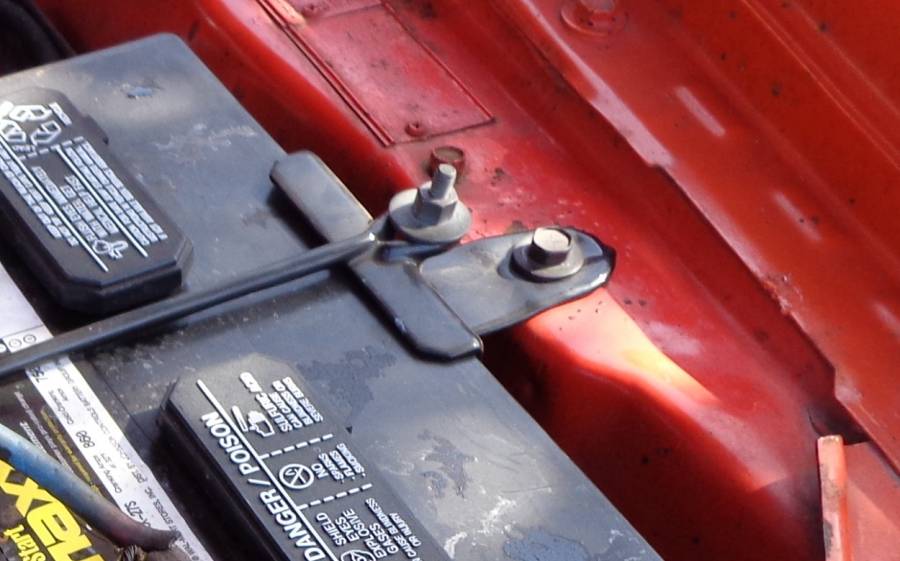 Attached picture moparts 1972 battery hold down.jpg